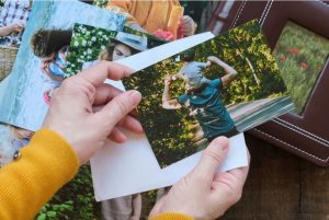 A woman looking through photos