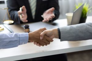 Two people shaking hands