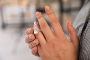 Woman taking her wedding ring off