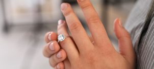 Woman taking her wedding ring off